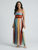 FJØRNA women's summer maxi dress with striped strapless design and pleated details, perfect for warm weather.