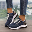 FJØRNA women's orthopedic sneakers with breathable mesh and non-slip soles, designed for comfort and support.