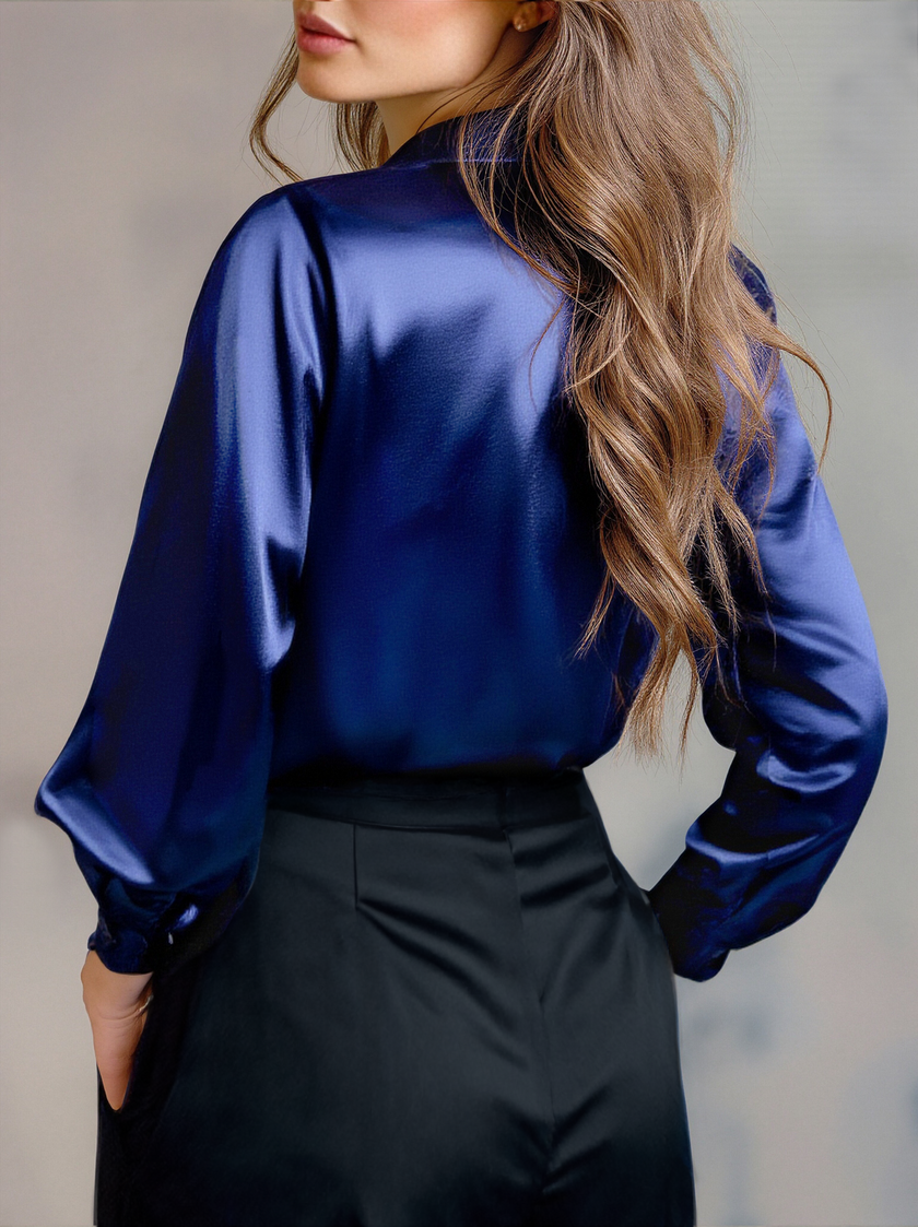 Cream long-sleeve satin lapel blouse for women by FJØRNA, stylish top with elegant fabric and tailored fit.