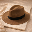 Men's FJØRNA Carolus Handmade Classic Panama Hat, summer sun hat with wide brim and woven straw texture.