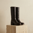 FJØRNA tan knee-high leather block heel boots for women, winter shoes with sturdy heels and sleek design.