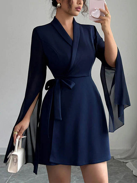 White FJØRNA A-line dress with elastic waistband, see-through fabric, interlace design, and split-joint details.