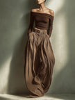 FJØRNA women's lightweight summer trousers with wide legs, high waist, and belt, made of comfortable, breathable fabric.