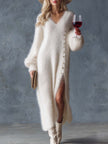 White knit V-neck midi dress for women by FJØRNA, featuring a fitted silhouette and soft, textured fabric.