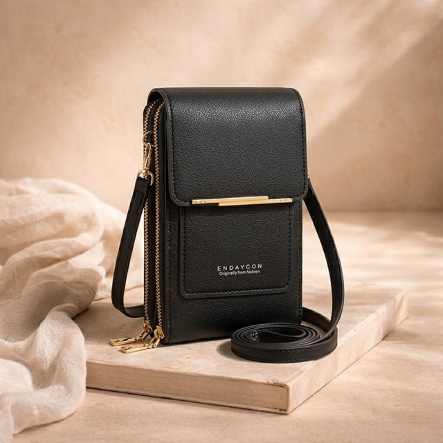 FJØRNA anti-theft crossbody bag for women with compact design, travel shoulder bag featuring secure zippered compartments and adjustable strap.