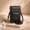 FJØRNA anti-theft crossbody bag for women with compact design, travel shoulder bag featuring secure zippered compartments and adjustable strap.