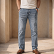 Men’s lightweight casual straight leg jeans by FJØRNA, showing the denim fabric and classic fit design.