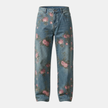 Unisex rose print wide-leg floral denim jeans by FJØRNA, showing the colorful rose pattern and relaxed fit on the pants.
