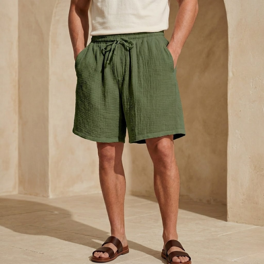FJØRNA men's textured drawstring relaxed-fit casual summer shorts, front view showing waistband and relaxed fit fabric