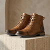 Men's FJØRNA leather orthopedic hiking boots with sturdy soles and ankle support for durable outdoor walking.