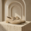 FJØRNA men's suede slip-on loafers showing a close-up of tan suede shoes with a sleek design and comfortable fit.