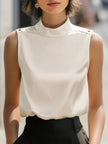 FJØRNA ivory high-neck sleeveless satin blouse for women, elegant white women's top with a smooth satin finish.