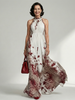 FJØRNA women's floral summer maxi dress with V-neck and long sleeves, flowing lightweight fabric perfect for warm weather.