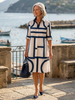 FJØRNA women's summer dress with geometric wrap design, featuring a stylish and comfortable fit for warm weather.
