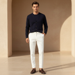 Men's FJØRNA slim fit ankle-length chinos, tailored pants in a classic style, shown in a neutral color with a clean fit.