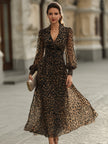 FJØRNA leopard print wrap midi dress with long sleeves, stylish and fitted for a chic, versatile look.