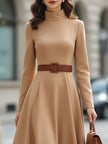 FJØRNA elegant camel turtleneck belted midi dress, showcasing a fitted silhouette and stylish design on a model.