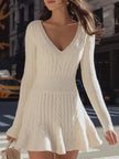 Cream cable knit V-neck flare hem sweater dress by FJØRNA, featuring a mini length and cozy, textured knit fabric.