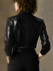 FJØRNA black crocodile-texture glossy sleeveless leather shirt, women's leather top with a sleek, shiny finish and structured design.