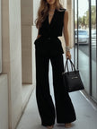 Light blue women's sleeveless two-piece trouser set with patch pockets by FJØRNA, shown with stylish pants.