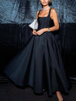 FJØRNA off-shoulder strapless sleeveless maxi dress for women, flowing fabric, elegant design, perfect for summer or formal events.
