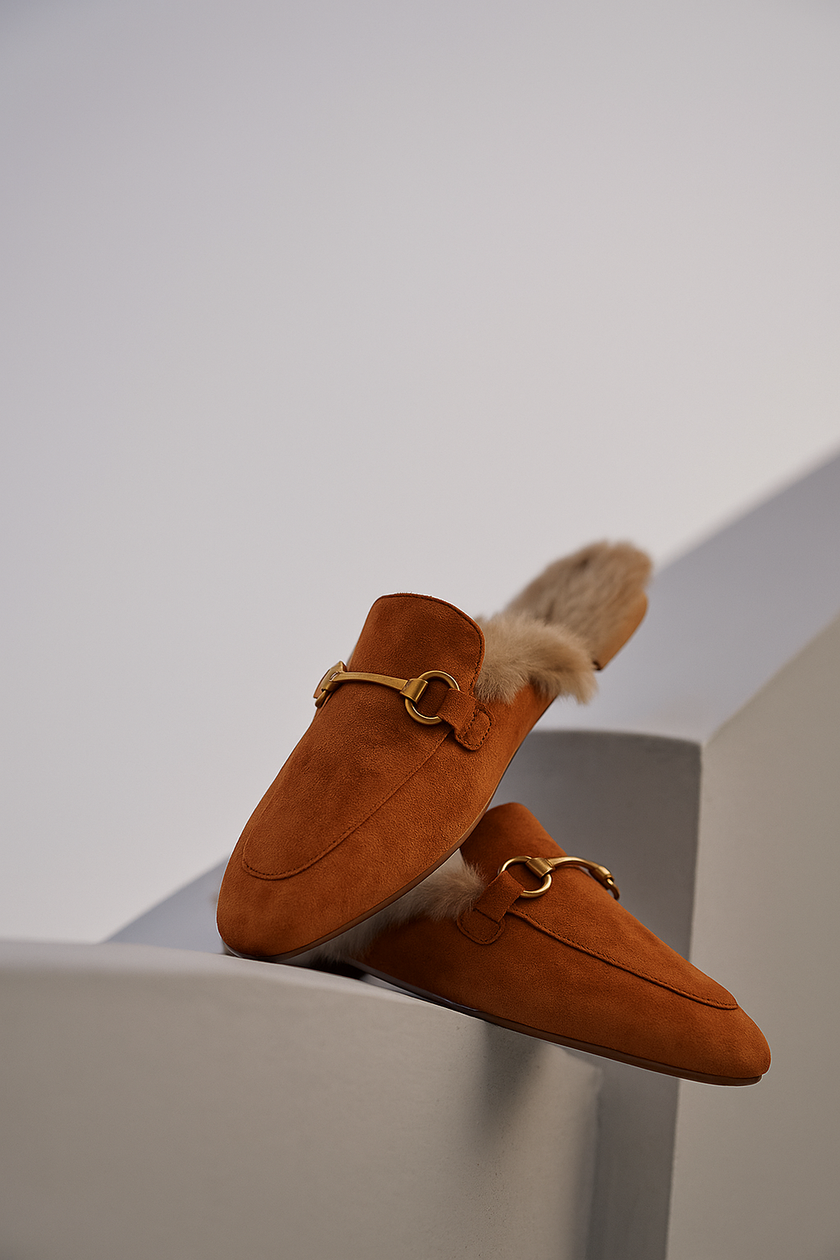 FJØRNA women's plush fur-lined slip-on mule slippers with elegant design and soft interior for cozy comfort.