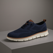Men's breathable knit mesh trainers by FJØRNA with cushioned waffle-pod sole, showcasing a minimalist design and athletic footwear style.