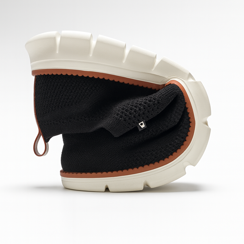Men's breathable knit mesh FJØRNA trainers with cushioned waffle-pod sole, showcasing sporty shoe design and comfortable fit.