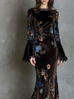 FJØRNA velvet floral evening dress with elegant design, featuring intricate floral patterns and a sophisticated silhouette.