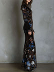 FJØRNA velvet floral evening dress with elegant design, featuring a fitted bodice and flowing skirt for formal occasions.