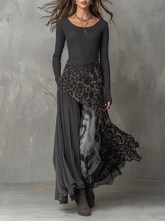 FJØRNA leopard print maxi dress, casual style, flowing fabric with bold animal print, full-length dress on model.