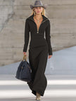 Pink V-neck maxi dress by FJØRNA, elegant evening dress with flowing fabric and V-shaped neckline, suitable for formal occasions.