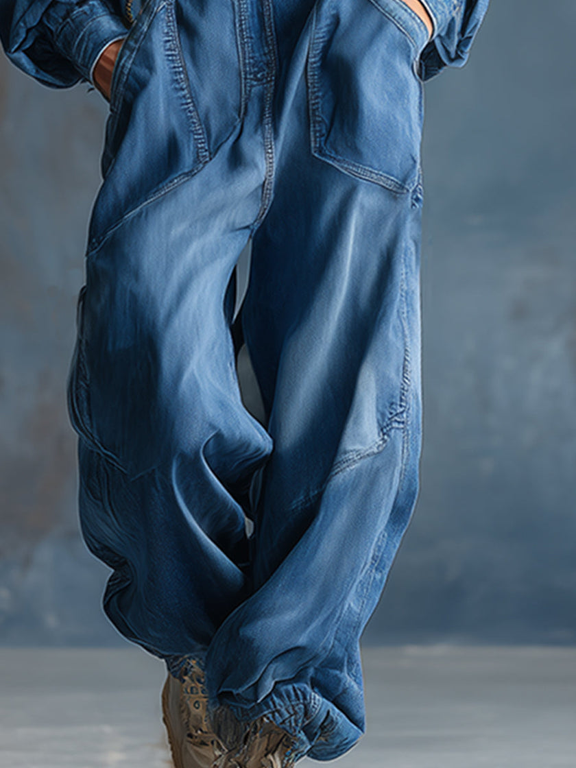 Blue denim FJØRNA women's hooded button-front long sleeve jumpsuit with long pants and casual style.