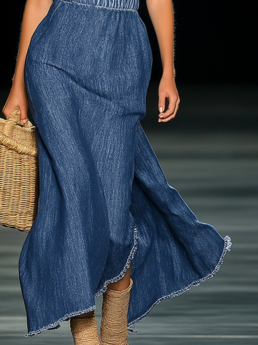 FJØRNA denim strapless maxi dress, evening dress with flowing fabric and fitted bodice, styled for elegant occasions