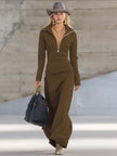 Pink V-neck maxi dress by FJØRNA featuring a flowing silhouette and elegant design, perfect for evening wear.