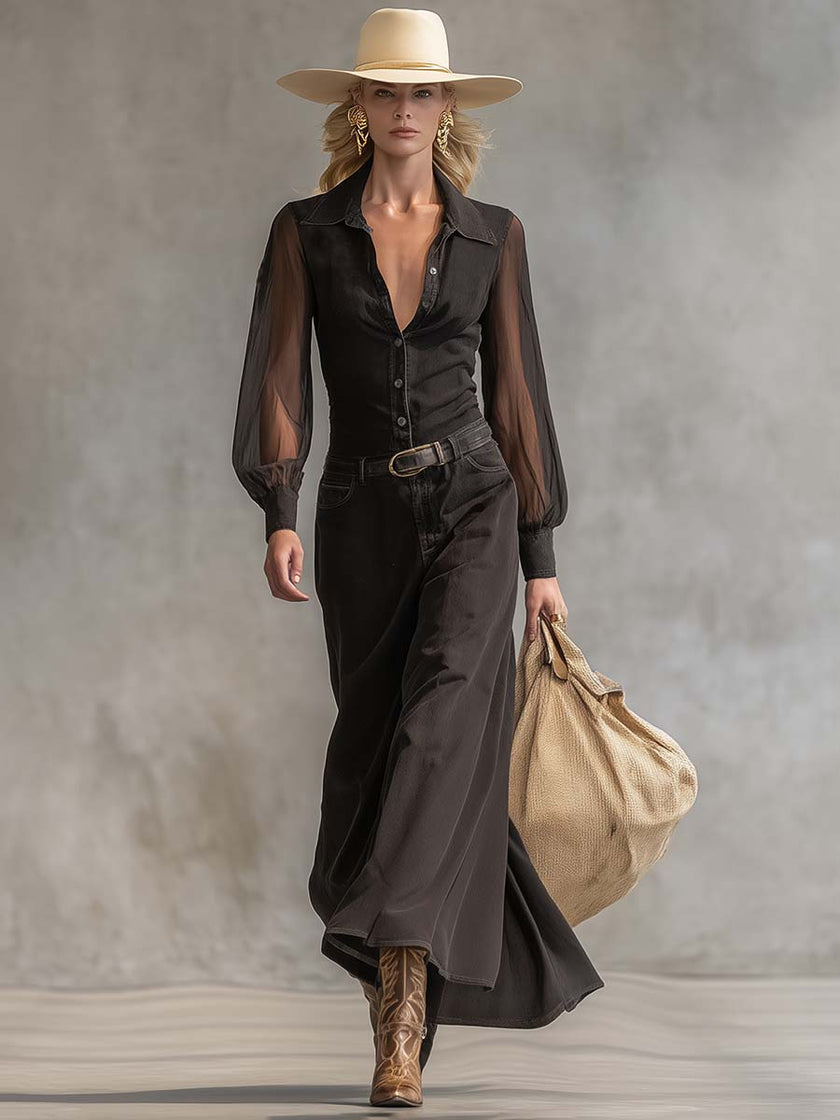 Black denim V-neck maxi dress by FJØRNA, featuring a casual style with a flowing silhouette and sleeveless design.