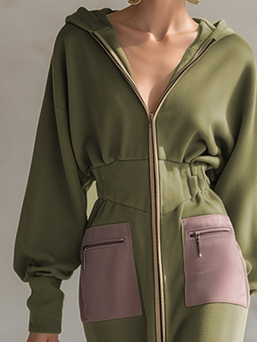 Green long sleeve maxi dress by FJØRNA, elegant evening dress with flowing fabric and fitted waist, perfect for formal occasions.