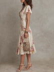 FJØRNA chiffon floral midi dress, elegant evening dress with flowing fabric and vibrant floral pattern, perfect for special occasions