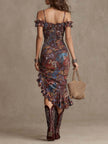 FJØRNA floral midi dress with a casual fit, featuring a colorful floral pattern and flowing fabric ideal for everyday wear.