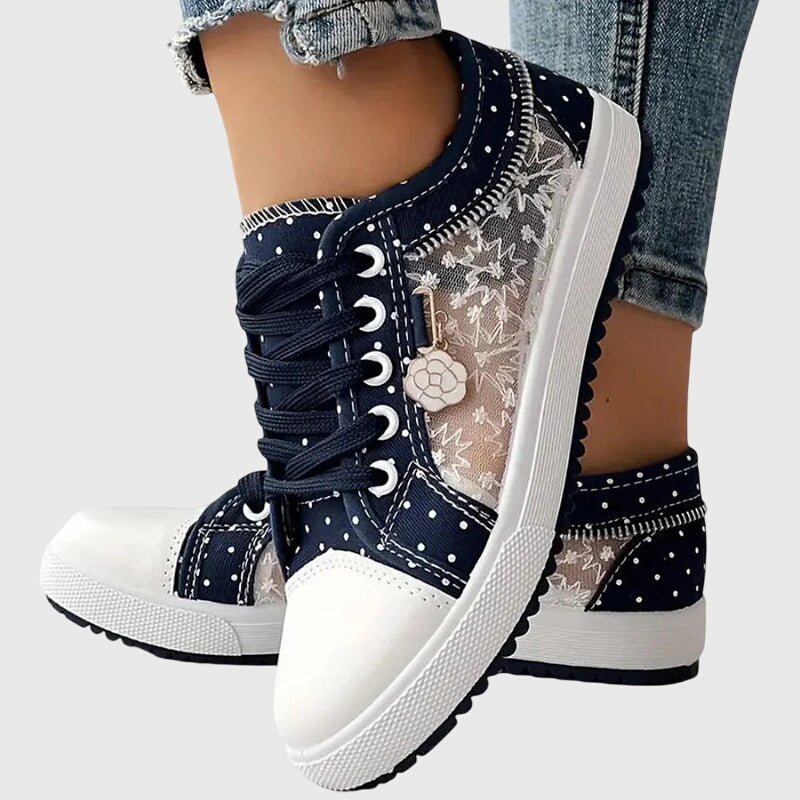 FJØRNA women's orthopedic sneakers with breathable mesh and cushioned support, designed for comfort and foot health.