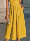FJØRNA women's collared short-sleeve midi dress with structured waist, showing the elegant design and fabric details.