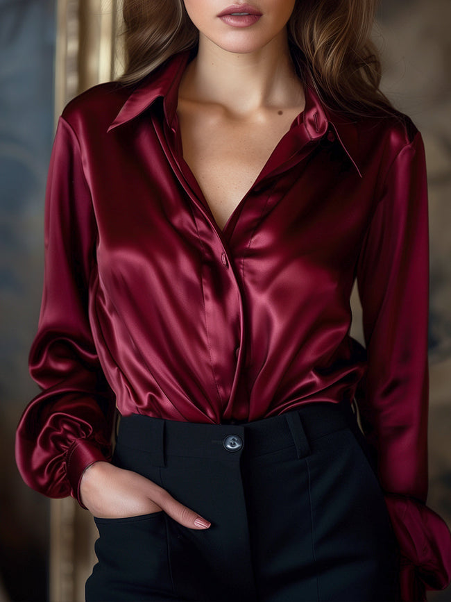 Cream long-sleeve satin lapel blouse for women by FJØRNA, featuring a stylish fit and elegant satin fabric.