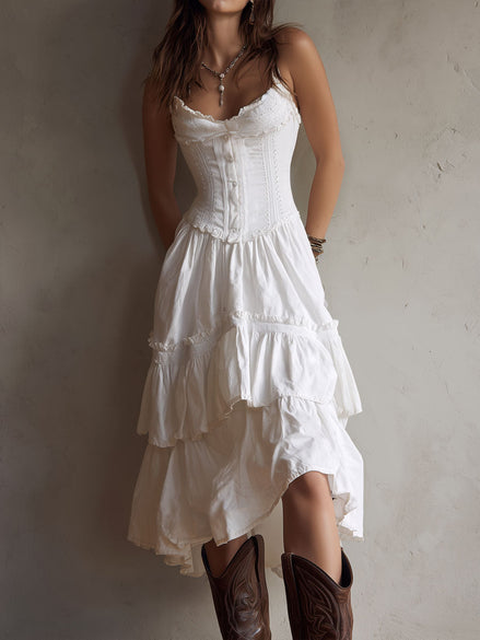 FJØRNA retro boho corset tiered midi dress with lace trim, featuring a flowing silhouette and vintage-inspired design.