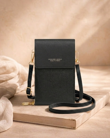 FJØRNA touchscreen crossbody phone bag for women, compact bag with transparent phone pocket and adjustable strap, stylish and functional.