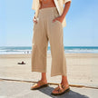 Women’s wide-leg denim jeans by FJØRNA, casual pants with a relaxed fit and classic blue denim fabric.