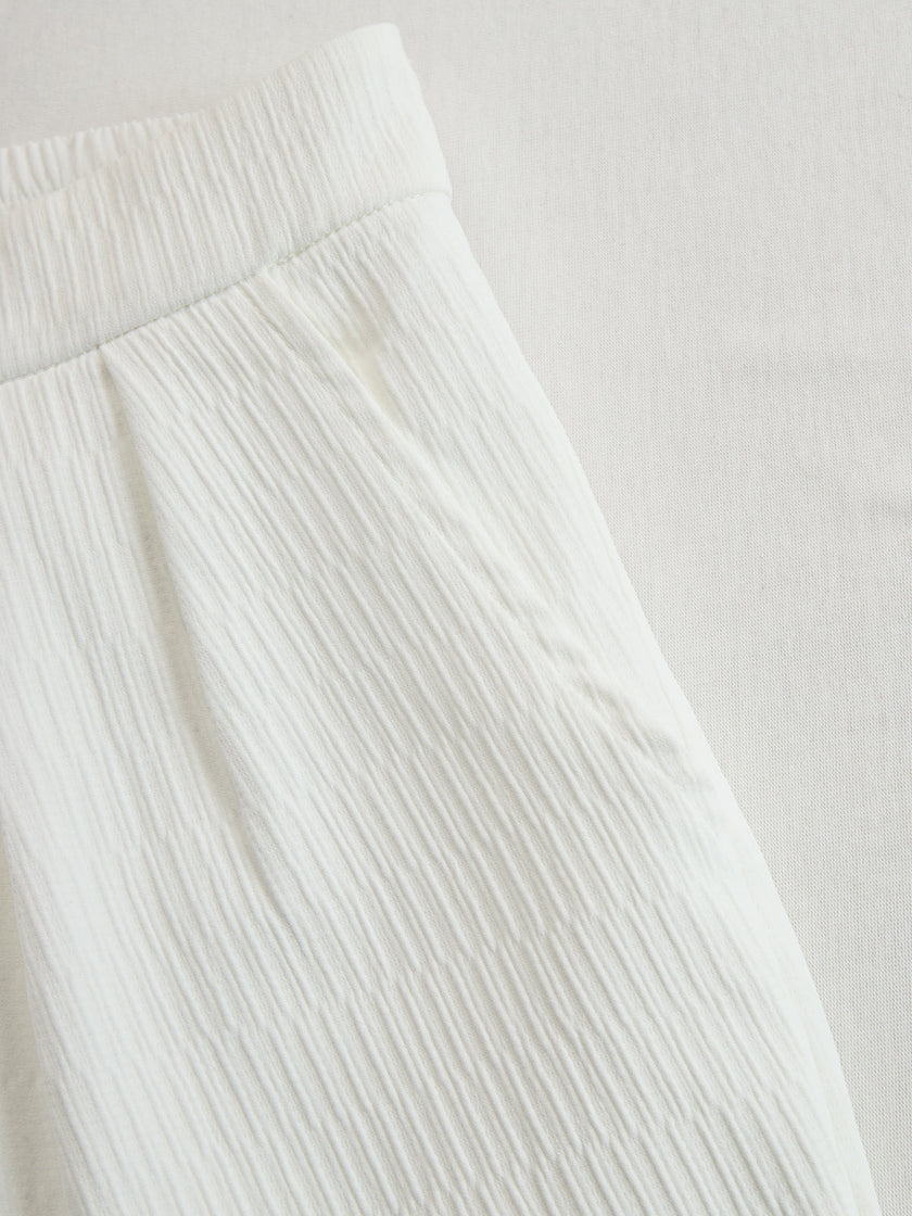 Cream textured lantern sleeve two-piece set for women by FJØRNA, featuring stylish pants and a matching top.