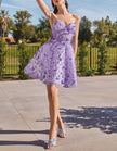 Black tulle cocktail dress for women with floral puff sleeves by FJØRNA, featuring elegant and stylish design.