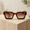 FJØRNA vintage 90s rectangular unisex sunglasses with retro style and dark tinted lenses, accessory for women and men.