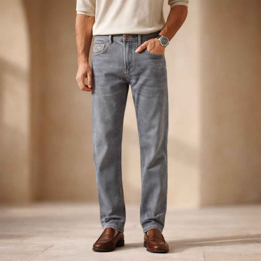 Men’s slim fit grey wash jeans by FJØRNA, casual pants featuring a classic five-pocket design and modern fit.
