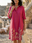 FJØRNA women's floral summer dress with pockets, flowy design and lightweight fabric, perfect for warm weather.